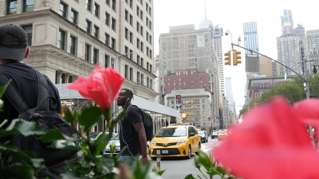 New York City, United States - 8 Sept 2023: Manhattan Midtown Broadway, 23 street, 5 avenue crossroad intersection. Worth Square near Madison Park and Flatiron Building, USA. People. Yellow taxi car