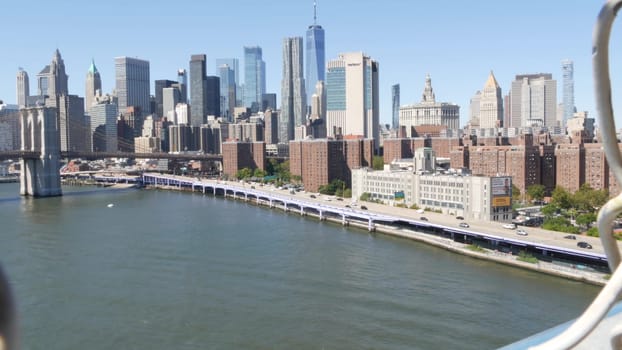 New York City, United States - 14 Sept 2023: Brooklyn Bridge from Manhattan Bridge. Downtown skyline, financial district cityscape, World Trade Center. Transport traffic, FDR Drive highway, East River