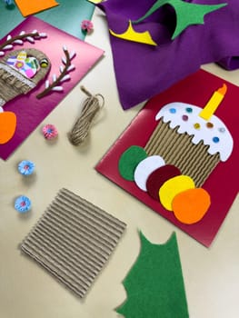 Engaging process of creating beautiful Easter cards using vibrant felt, yarn, and paper. Perfect materials for crafting unique cards and celebrating joyful spring moments