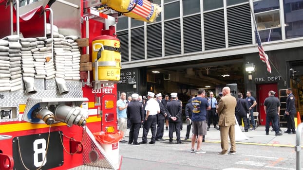 New York City, United States - 11 September 2023: Firefighters celebrate Patriot Day. 911 memorial remembrance event, FDNY commemorate anniversary. Fire Department Station, Manhattan Midtown firehouse