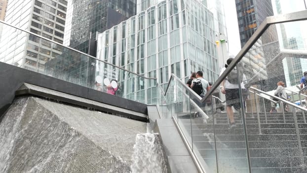 New York City, United States - 11 Sept 2023: Manhattan Midtown office buildings, Lexington avenue, United States. People pedestrian exiting subway metro station, stairs on 53 street, USA urban life.