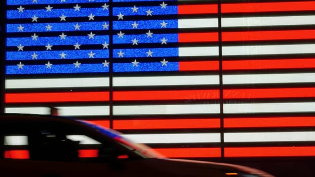 New York City, United States - 5 Sept 2023: Times Square, Manhattan Midtown Broadway street, USA. American flag, NYC urban life. Military island, army recruiting office. People silhouettes, car shadow
