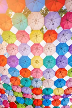 beautiful multicolored bright colorful umbrellas decoration on festive street on Magic City Park in Tashkent in Uzbekistan