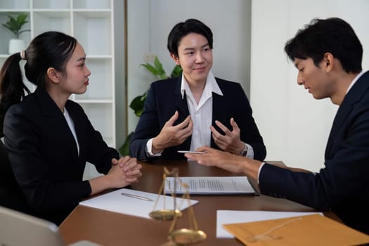 Lawyers collaborate on a legal case, highlighting the importance of teamwork and strategic planning to achieve the desired outcome.