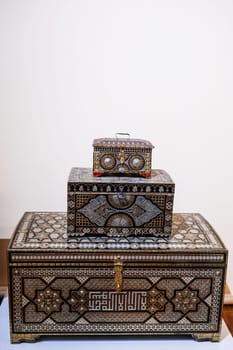 decorative wooden antique vintage chests with metal trim in traditional Uzbek style in Uzbekistan