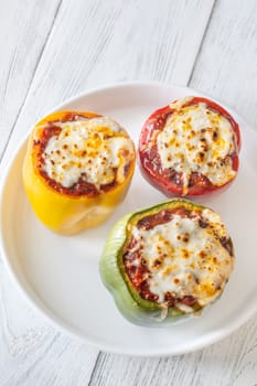 Vibrant bell peppers are baked to perfection, generously stuffed with rich bolognese sauce, and crowned with melted mozzarella