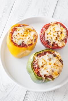 Vibrant bell peppers are baked to perfection, generously stuffed with rich bolognese sauce, and crowned with melted mozzarella