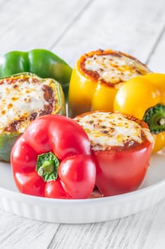 Vibrant bell peppers are baked to perfection, generously stuffed with rich bolognese sauce, and crowned with melted mozzarella