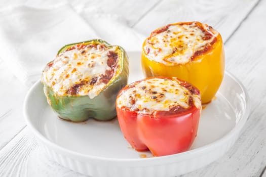 Vibrant bell peppers are baked to perfection, generously stuffed with rich bolognese sauce, and crowned with melted mozzarella