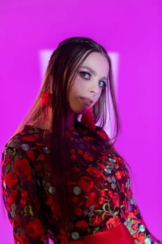 A striking and eyecatching fashion portrait that showcases unique floral patterns along with vibrant lighting effects