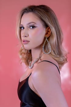 A stunning portrait that highlights glamorous makeup and stylish fashion against a vibrant background