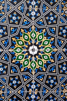 ceramic tiles with a traditional Uzbek oriental pattern in Uzbekistan. Decorative floral background with Islamic ornament