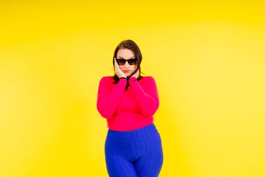 Full length photo of young smiling fat overweight woman wearing sportswear