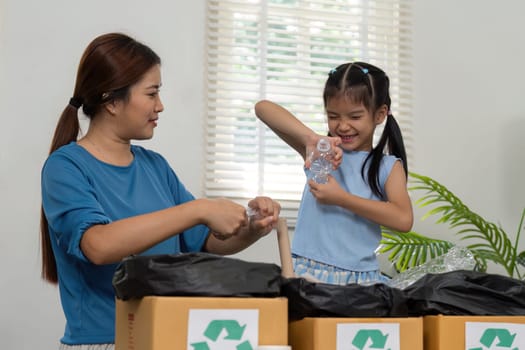 A mother teaches her child about recycling, sorting different materials together in a fun and engaging way. They create memories while promoting eco-friendly practices.