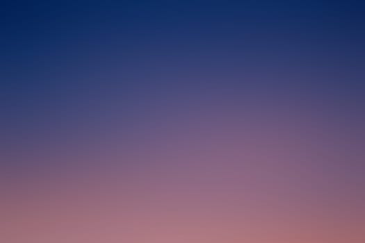 The stunning view of a sunset sky adorned with a multitude of fluffy clouds within it, creating a mesmerizing scene of colors and beauty