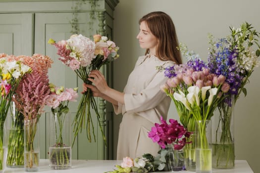 Florist arranging elegant bouquet in flower shop, surrounded by fresh blooms, smiling with joy. flower shop