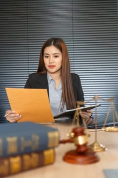 A dedicated lawyer reviews essential case documents, preparing for upcoming legal proceedings with acute attention to detail and strategy.