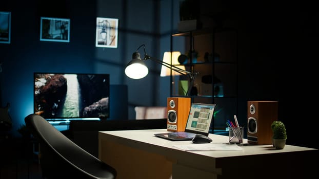 Contemporary apartment with a minimalist home office design. Wooden furniture, decorative plants and a cozy living room create a stylish spacious space perfect for work and relaxation.
