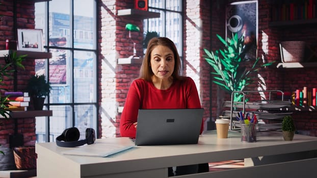 Female applicant at a virtual job interview chatting via online video call, applying for a job vacancy listed on a web recruiting platform. Ambitious woman looking to get hired, job offer. Camera B.