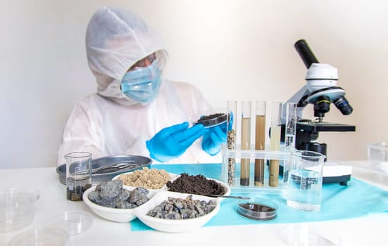 Soil testing in the laboratory. Selective focus. Nature.