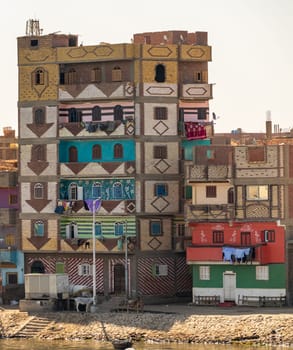 Colorful newly constructed apartments and homes by the banks of the Nile in Esna