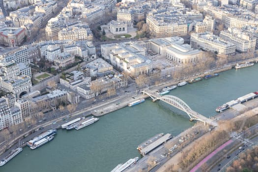 Paris city panorama with Pont Debilly Footbridge, the aerial view from the Eiffel tower in early spring.