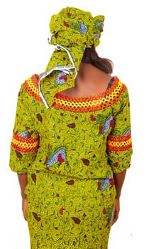 African adult woman presenting her beautiful outfit in green loincloth, with short sleeves in the back.