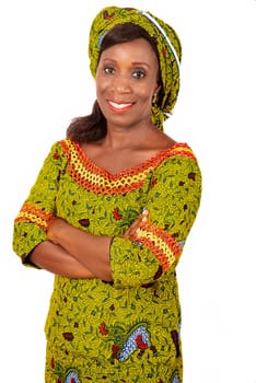 beautiful african adult woman dressed in green loincloth is smiling