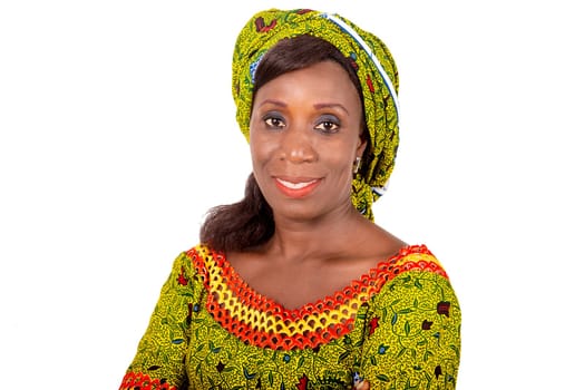 beautiful african adult woman dressed in green loincloth is smiling