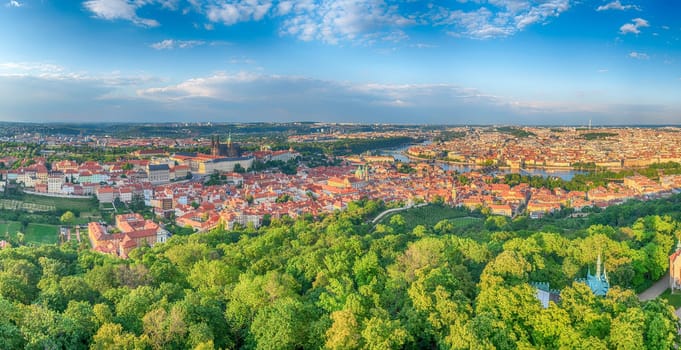Panoramic view of the city center of Prague, Czech Republic, with the Vltava River flowing through it, as seen from Petrin hill