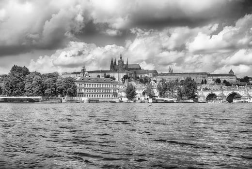 Prague Castle is overlooking the city of Prague, Czech Republic from its elevated position on a sunny day