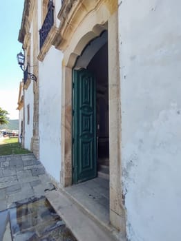 Paraty, Rio de Janeiro, Brazil, February 6, 2025, side view of the front colonial portal of the Catholic Church of Santa Rita.