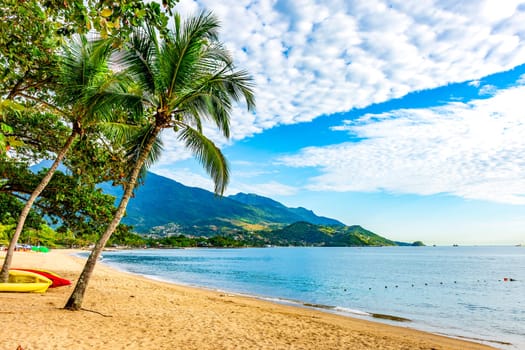 Beach in the urban area of ​​Ilhabela on a summer day