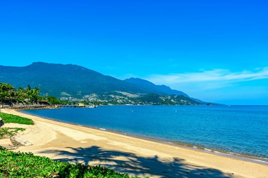 Beach and waterfront of Ilhabela city on a sunny summer day