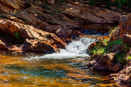 Small waterfall and stream in the state of Minas Gerais, Brazil