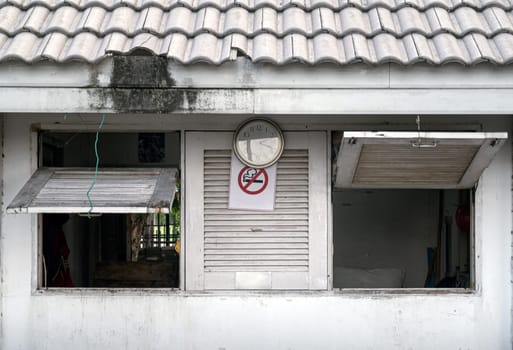 Bangkok, Thailand - 28 Sep, 2024 - Old security guard booth with Weathered and Faded paint (Guardhouse) in public park. Security guard cabin, Security Booth, Space for text, Selective focus.