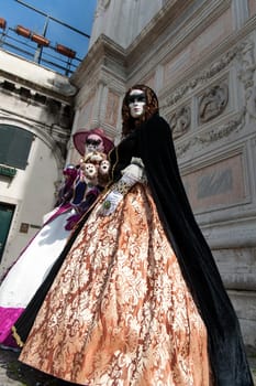 VENICE, ITALY - Febrary 28 2025: The masks of the Venice carnival 2025