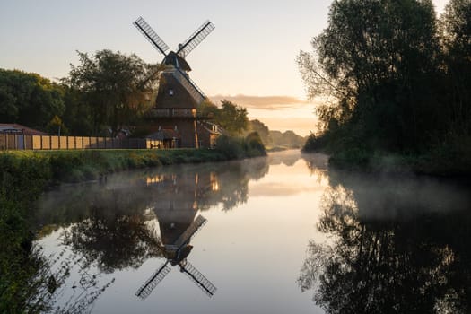 Hengstforder mill close to Bad Zwischenahn on a foggy morning, Lower Saxony, Germany