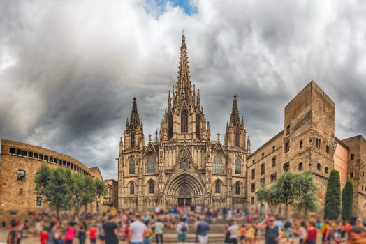 Panoramic view with the scenic facade of the gothic Cathedral of the Holy Cross and Saint Eulalia, aka Barcelona Cathedral, Catalonia, Spain