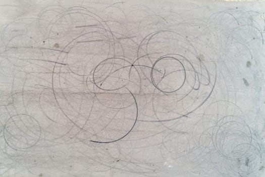 tire marks on the ground from a car doing burnouts