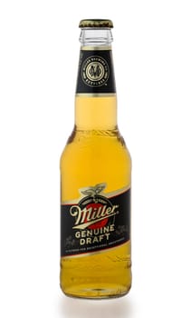 Gaziveren Cyprus -24.03.2025 A chilled glass beer Miller bottle reveals a golden liquid, symbolizing relaxation and enjoyment. Ideal for summer parties, it brings friends together for memorable moments under the sun.