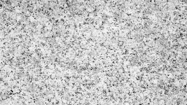 abstract background with black and white texture of granite tiles for pavement , facade and interiors