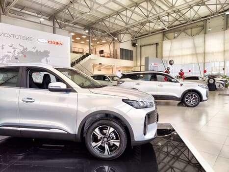 Tumen, Russia - November 09, 2024: Beautiful car in showroom of dealership Chery