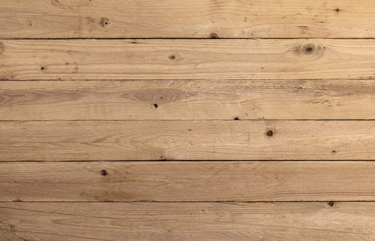 Horizontal wooden planks creating a rustic and textured background