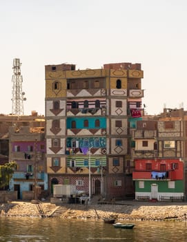 Colorful newly constructed apartments and homes by the banks of the Nile in Esna