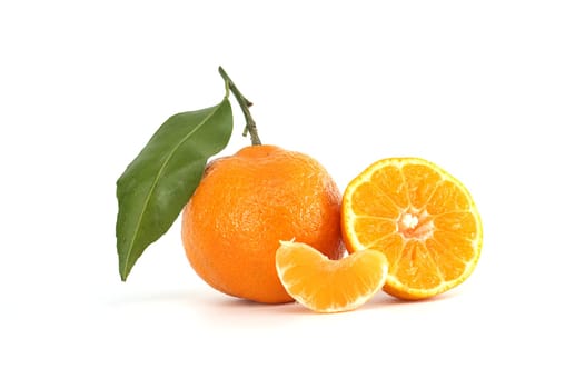 Orange fruit displayed fresh with a green leaf, a sliced half, and a segment placed neatly. Highlighting the vibrant, juicy, and natural qualities perfect for representing health and nutrition.