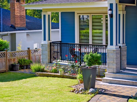 Front yard lawn and corner of residential house on spring season in British Columbia, Canada.