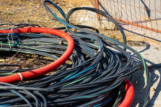 A diverse collection of colorful coiled cables with various textures for effective electrical system installation