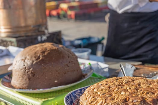 Moroccan sweets at a stall in a market in Marrakech. Morocco. Horizontally.
