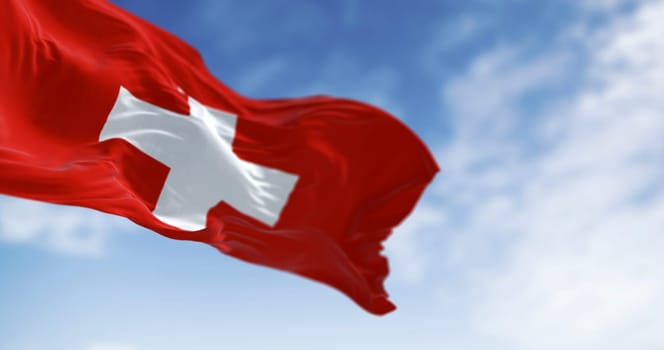 Swiss flag with a bold white cross on red square field, waving in the wind. A centuries-old emblem of neutrality, unity, and Alpine pride. 3d illustration render. Rippled fabric.